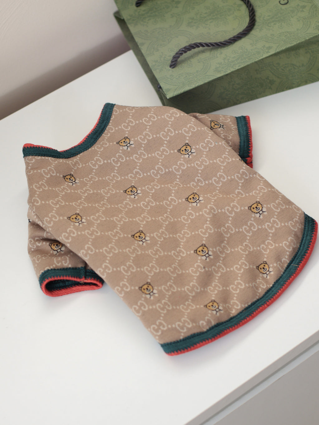 Beige cardigan with Gucci Bear print