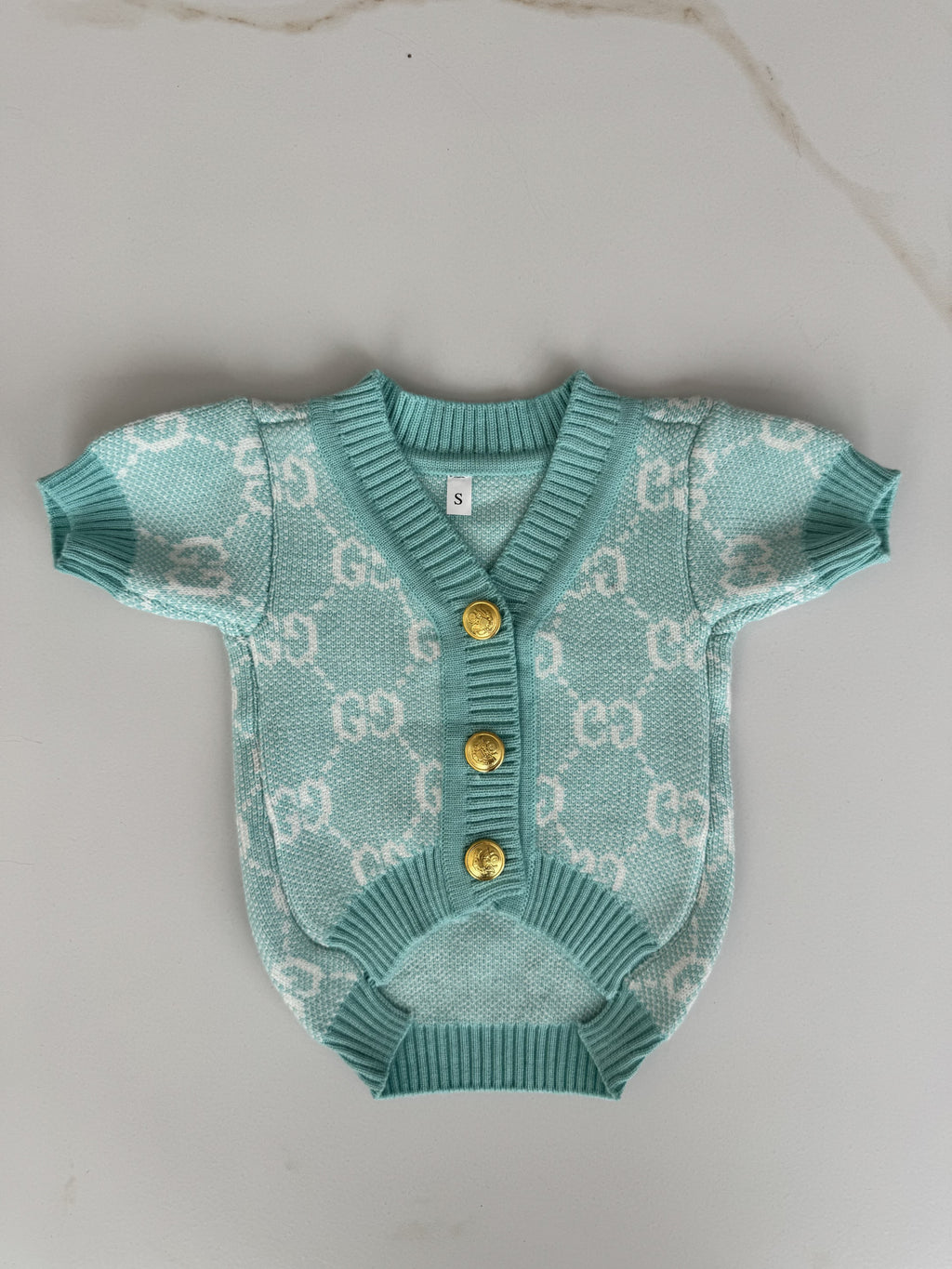 Turquoise cardigan with Gucci print