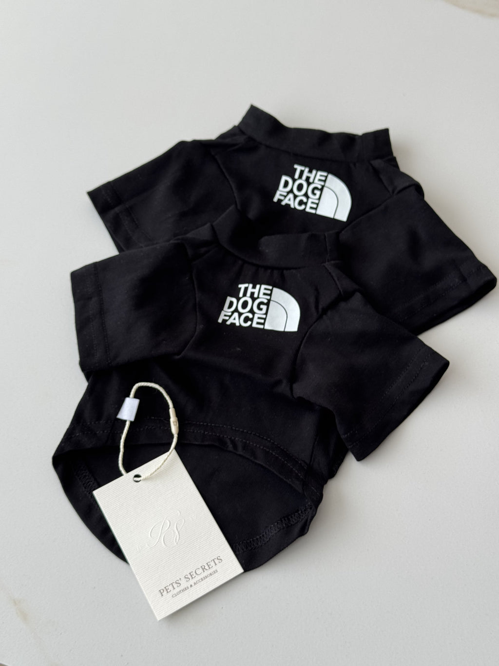 Black T-shirt with The Dog Face print