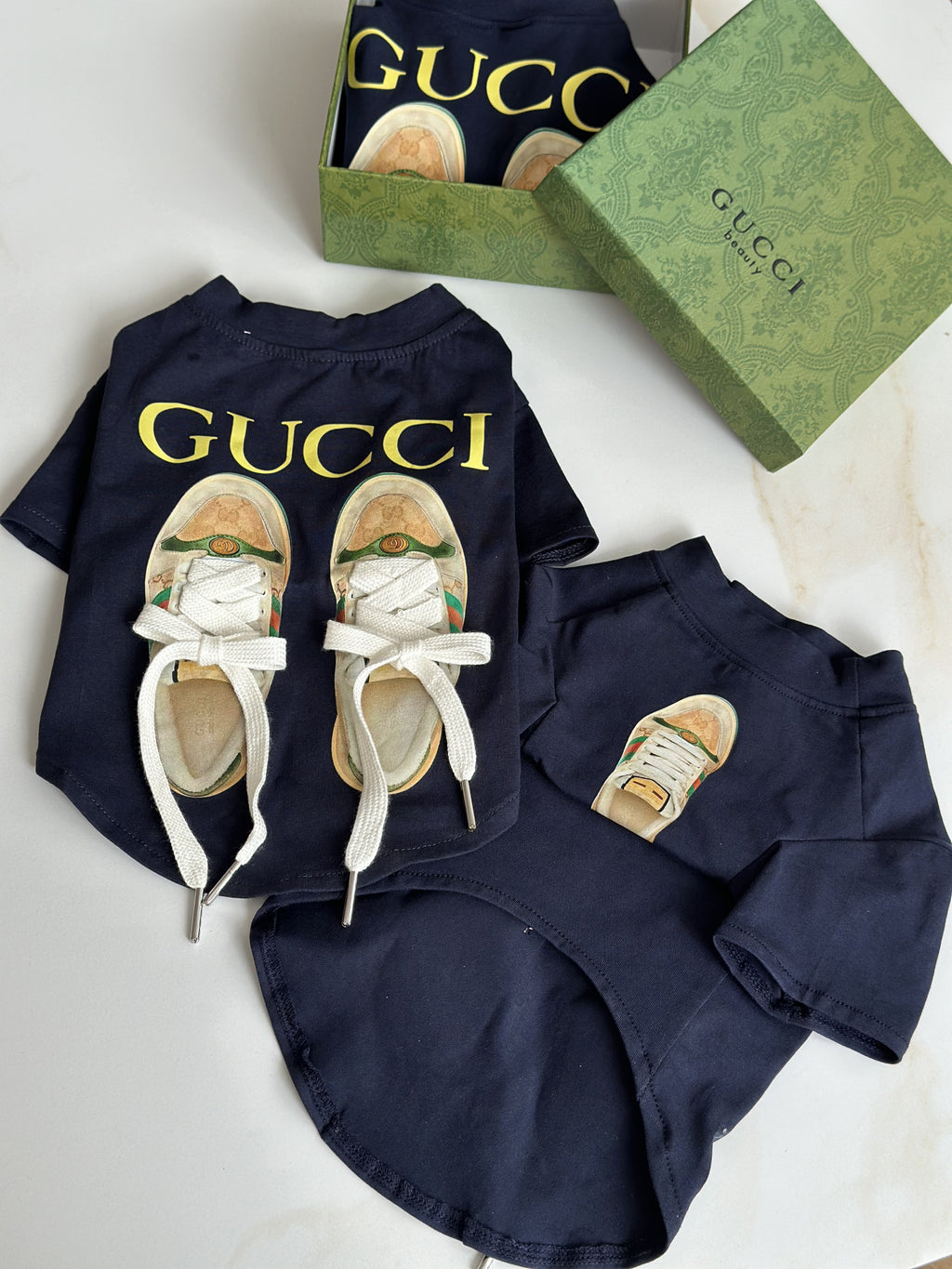 Navy blue T-shirt with sneakers and Gucci print