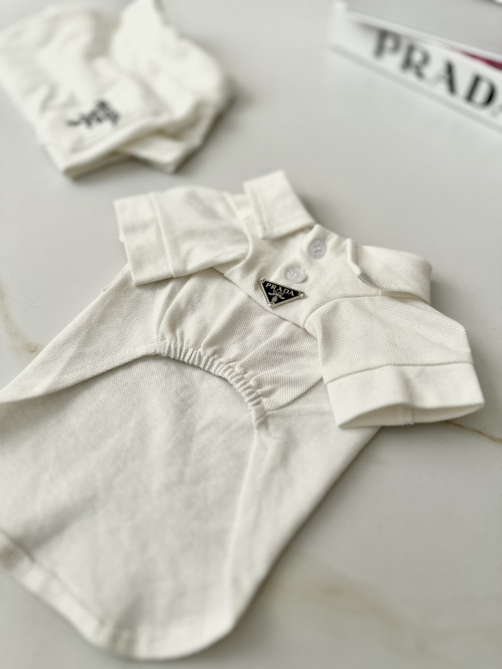 White polo shirt with Prada print