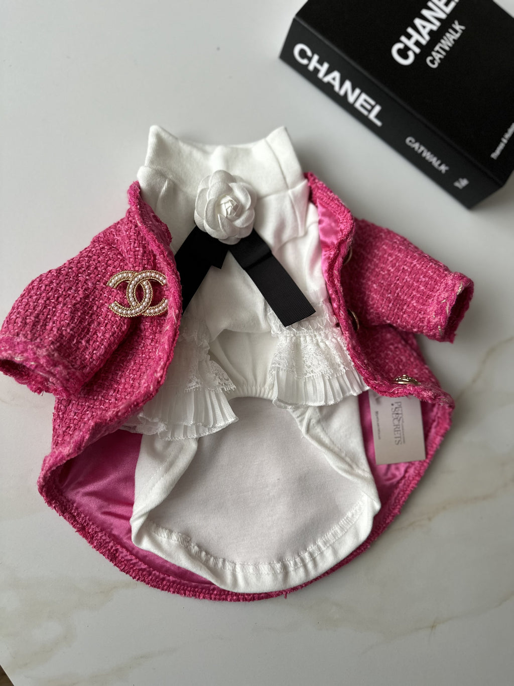 Кардиган рожевого кольору Chanel з гольфом білого кольору