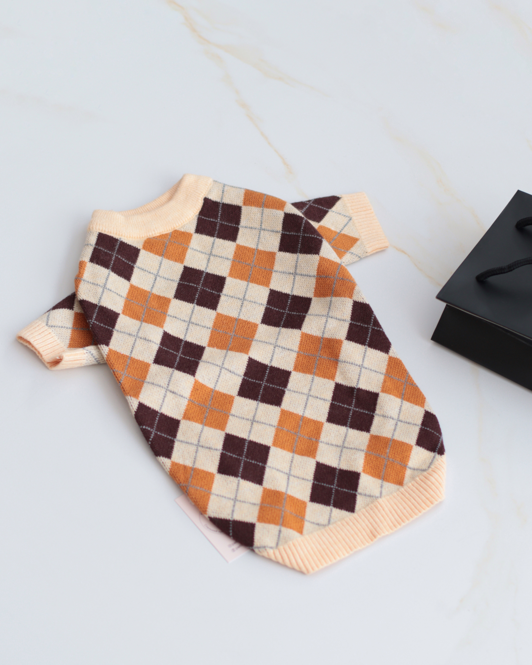 Светр бежевого кольору з принтом Ромби