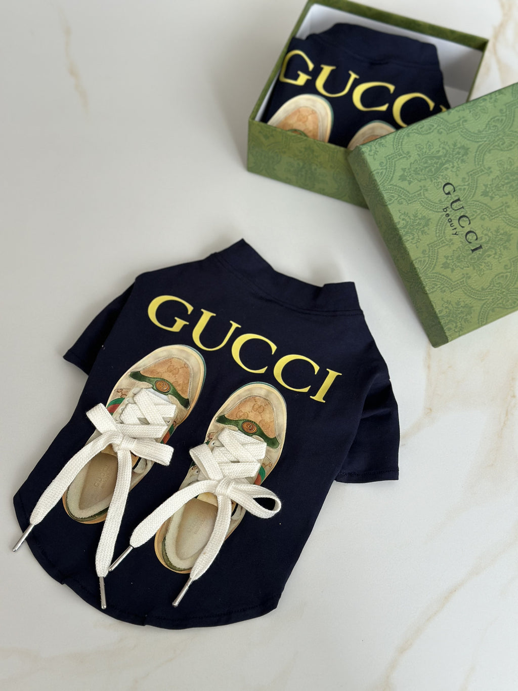 Navy blue T-shirt with sneakers and Gucci print