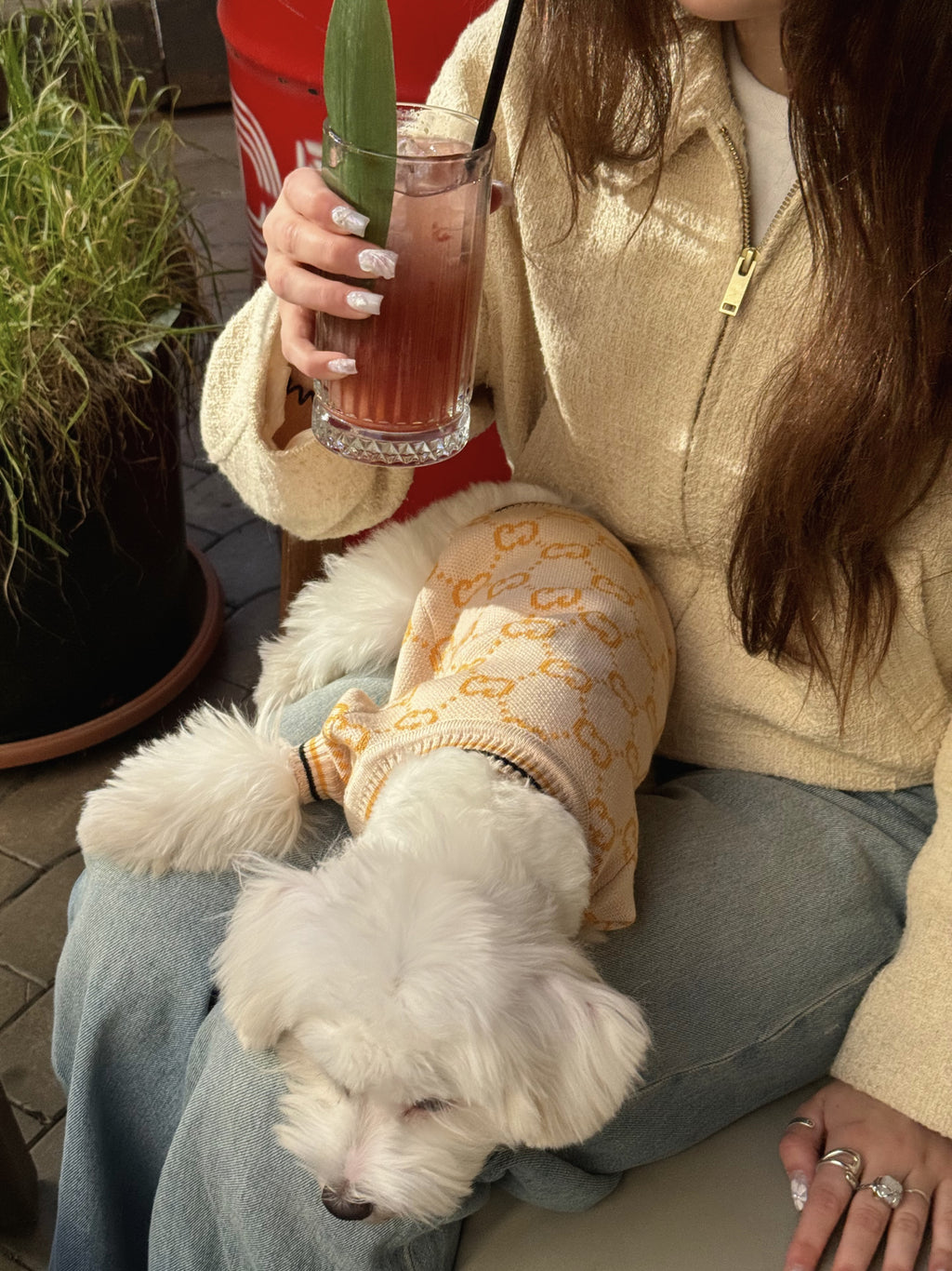 Beige cardigan with Gucci print