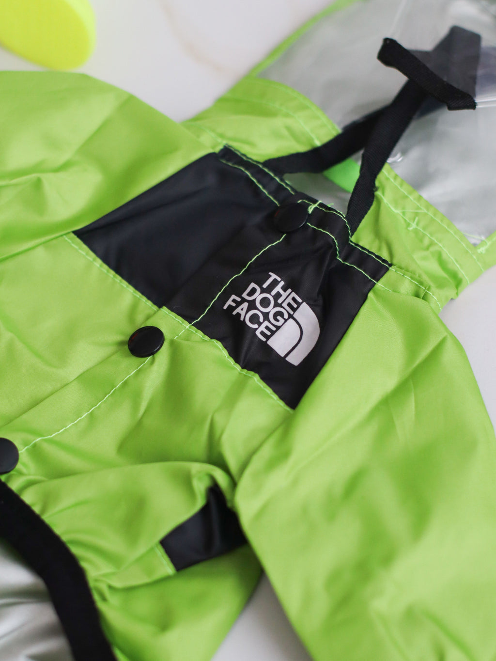 The Dog Face lime-colored raincoat