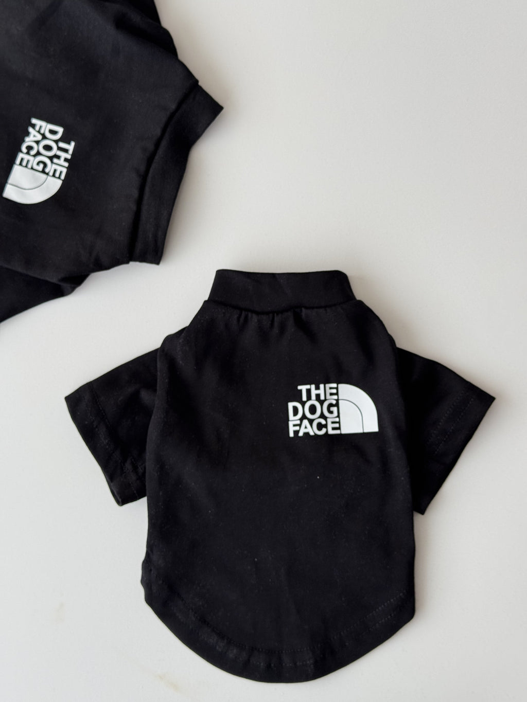 Black T-shirt with The Dog Face print