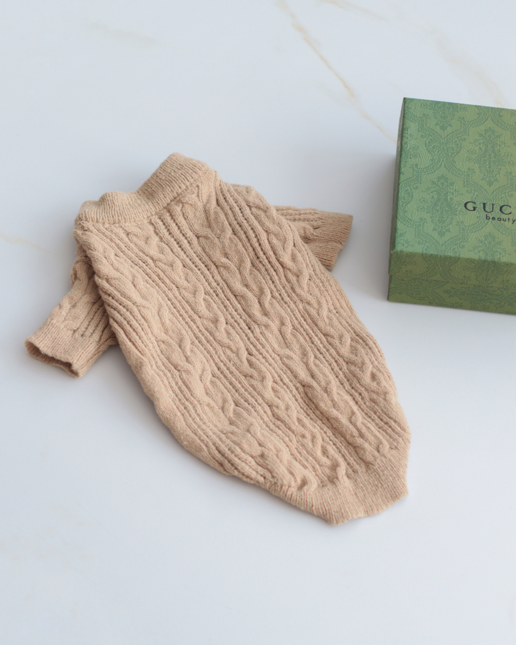 Светр бежевого кольору Косичка