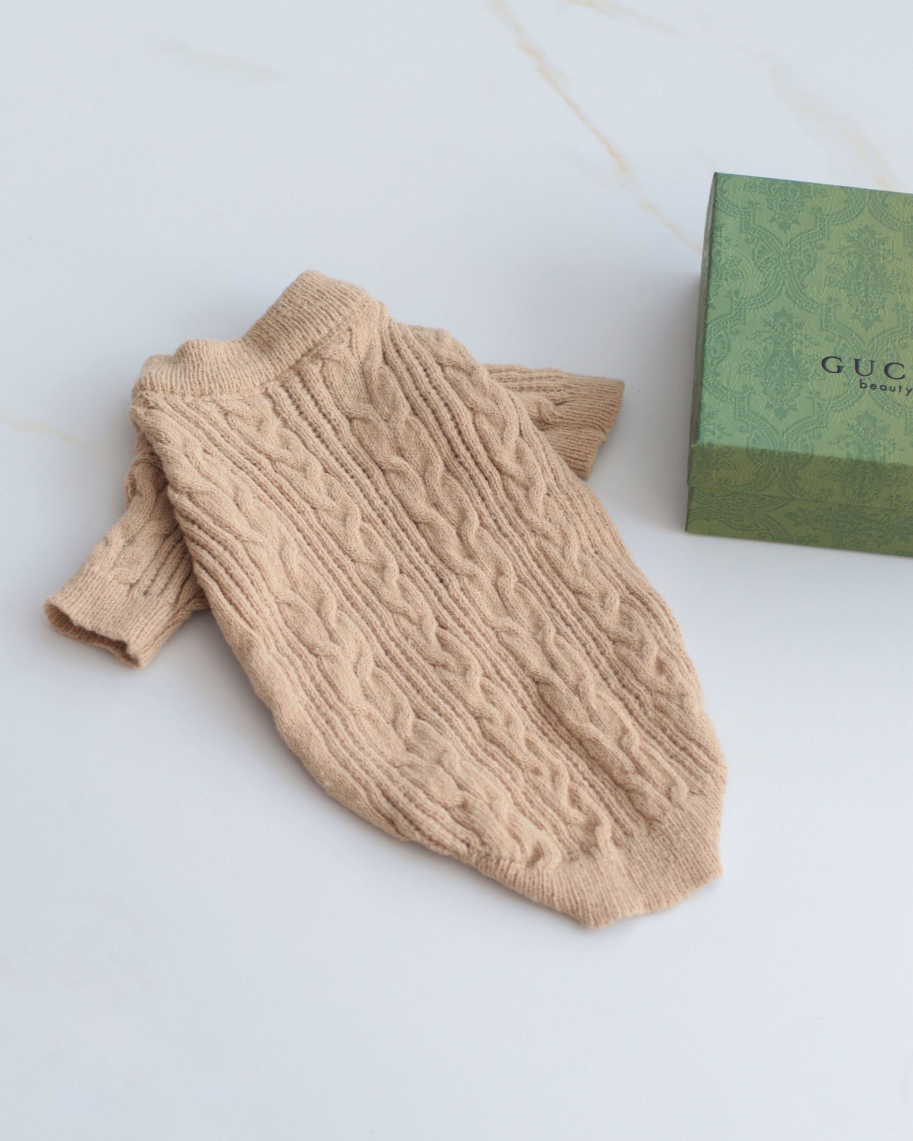 Светр бежевого кольору Косичка