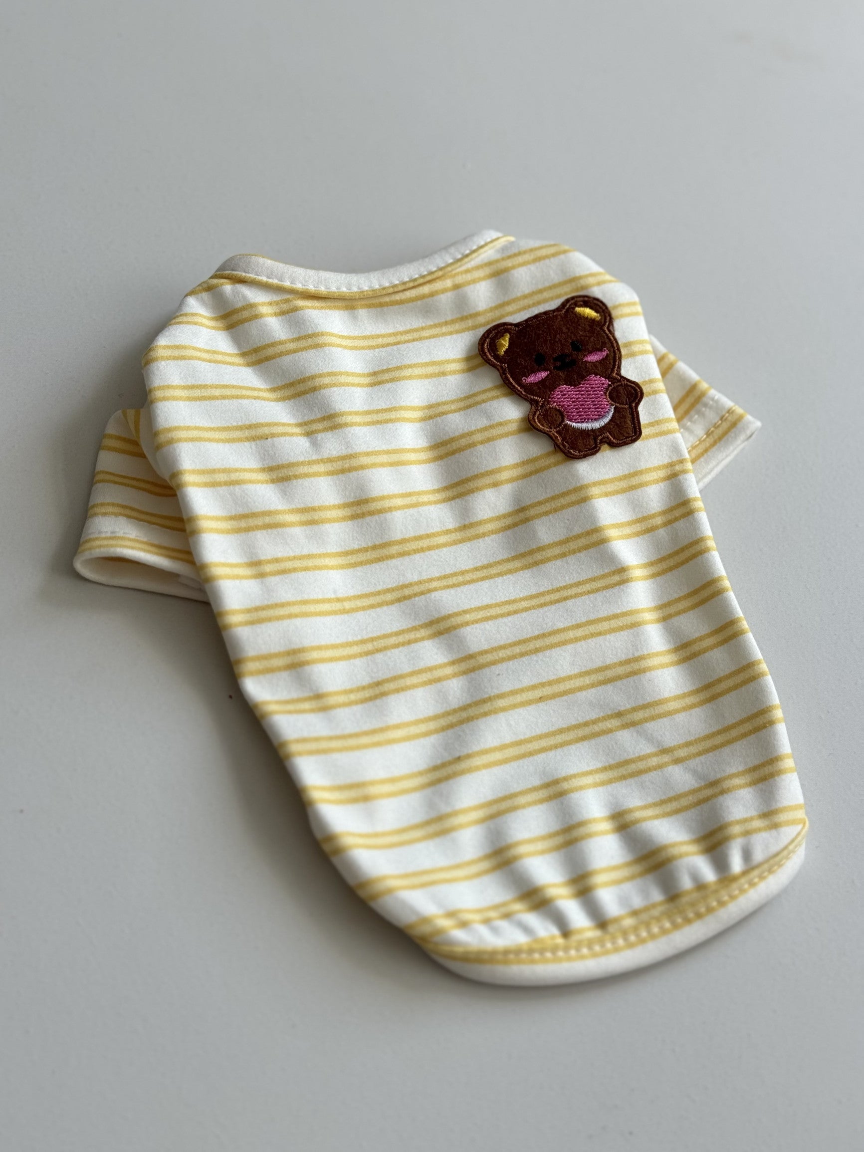 White T-shirt with yellow Teddy Stripes