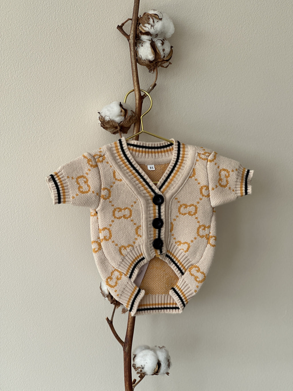 Beige cardigan with Gucci print