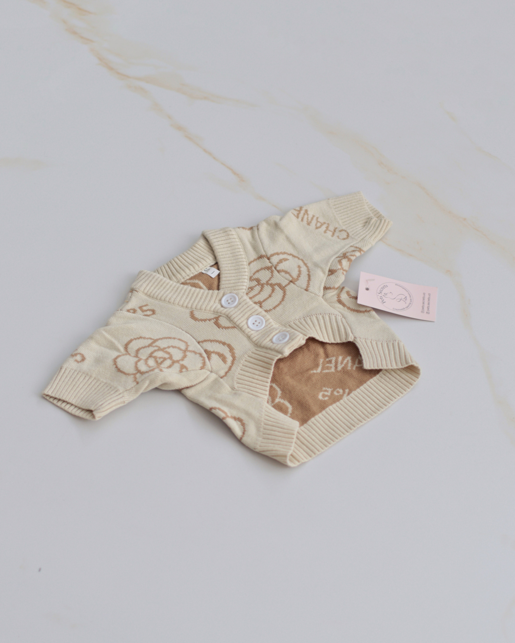 Кардиган бежевого кольору з принтом Chanel