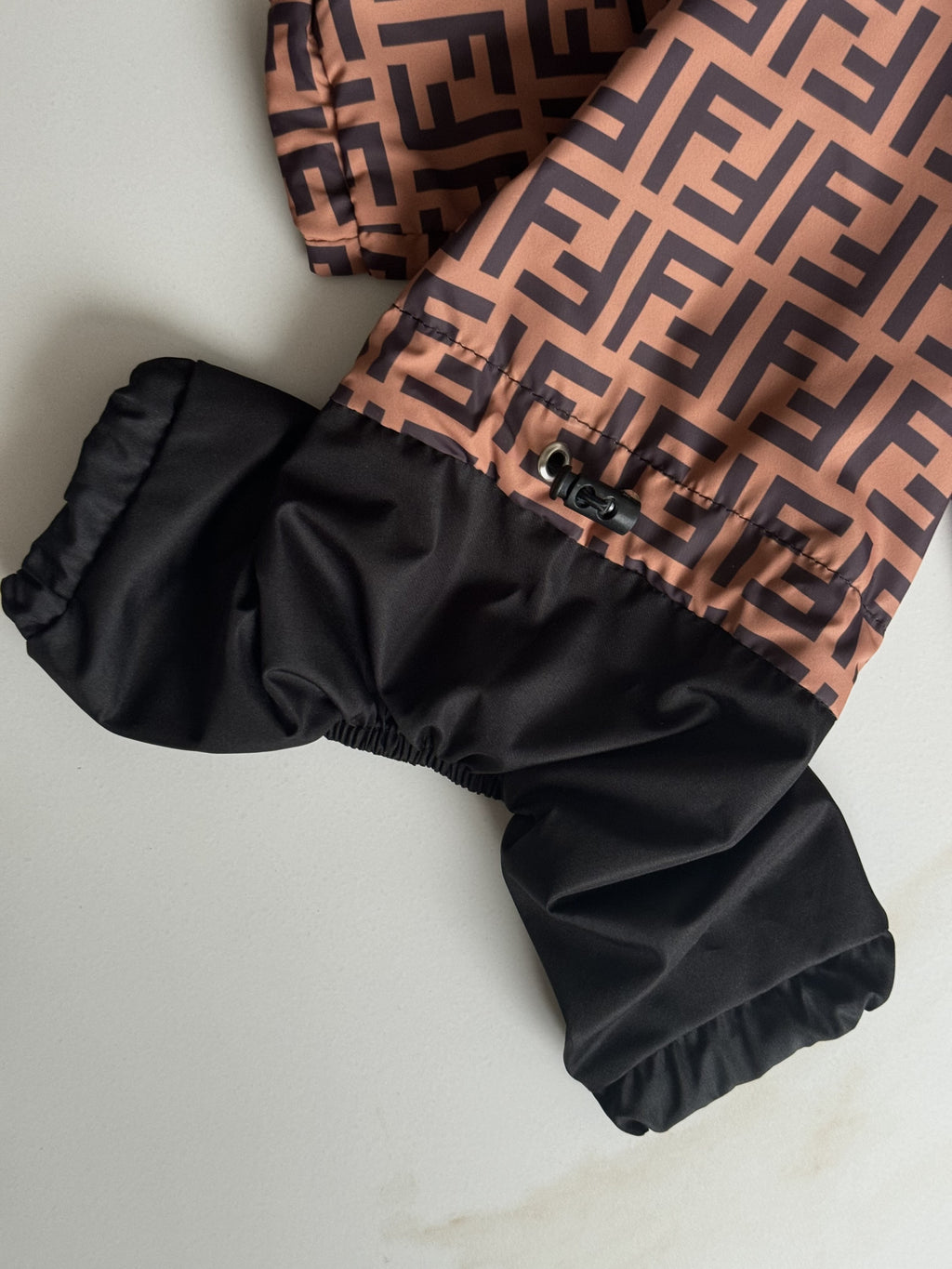 Brown raincoat with Fendi print