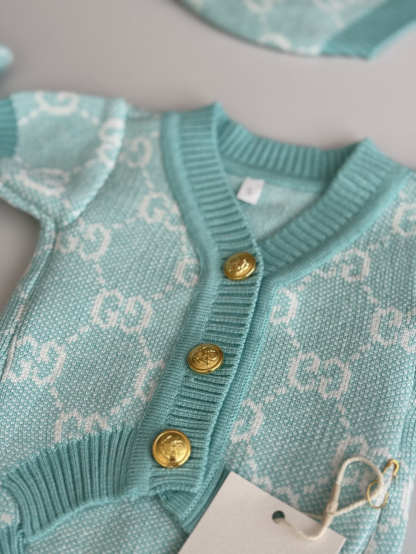 Кардиган бірюзового кольору з принтом Gucci