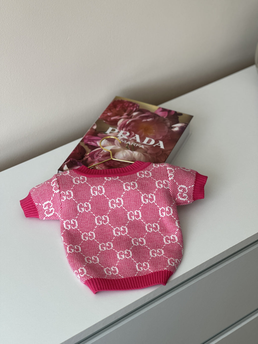 Pink cardigan with Gucci print