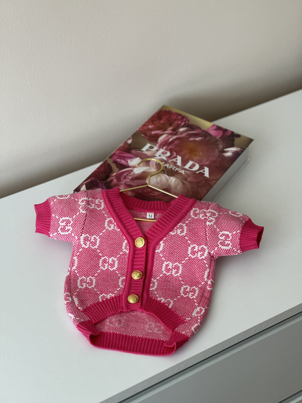 Pink cardigan with Gucci print